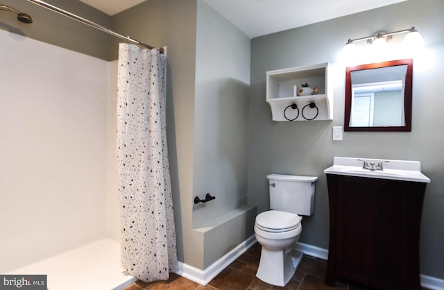 bathroom with vanity, toilet, and a shower with curtain