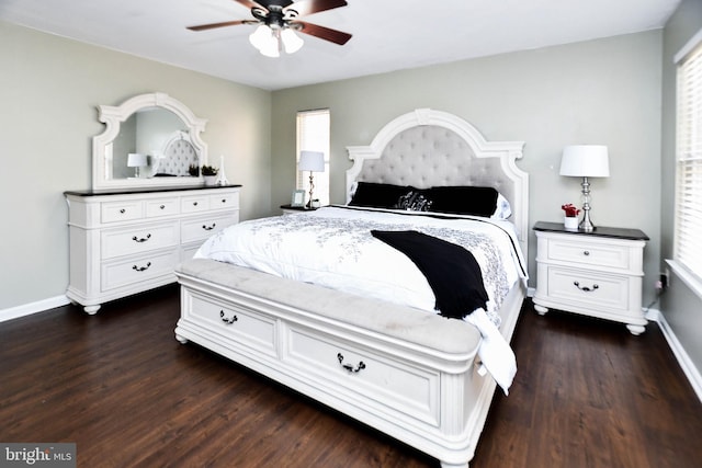 bedroom featuring dark hardwood / wood-style flooring and ceiling fan