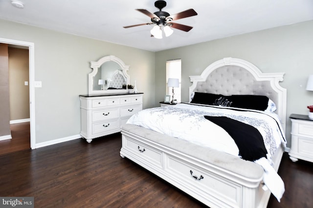 bedroom featuring dark wood-type flooring and ceiling fan