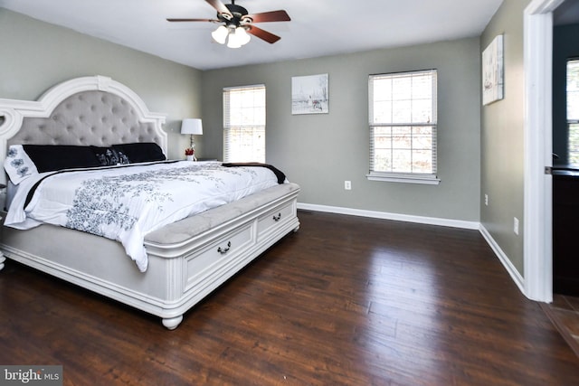 bedroom featuring ceiling fan and dark hardwood / wood-style floors