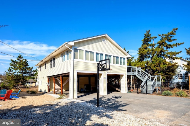 view of front of home with a carport