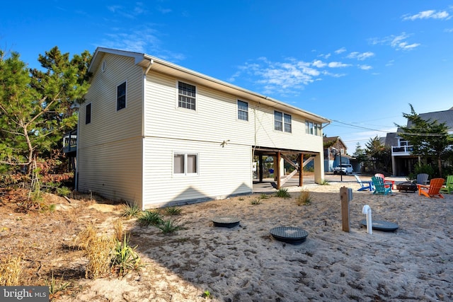 back of property featuring a patio