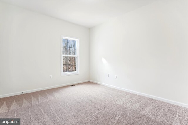 unfurnished room with carpet