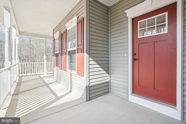 entrance to property with covered porch