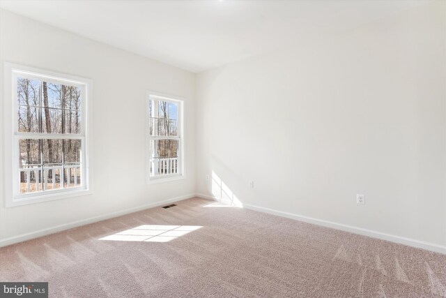 empty room with light carpet