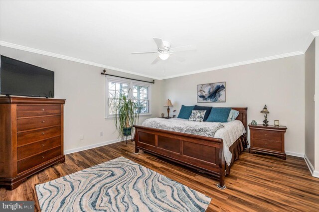 bedroom with ceiling fan, crown molding, and dark hardwood / wood-style floors