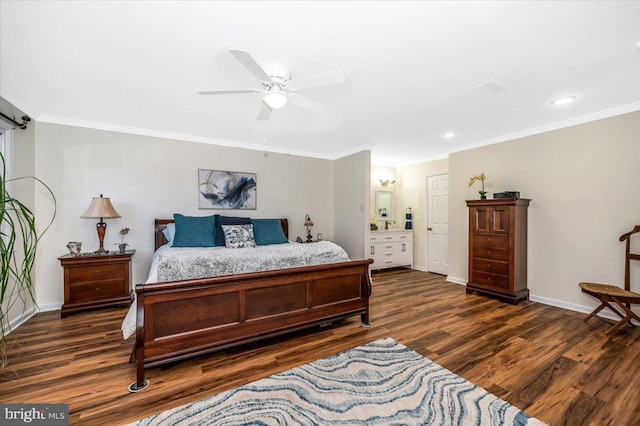 bedroom featuring ceiling fan, dark hardwood / wood-style flooring, connected bathroom, and ornamental molding