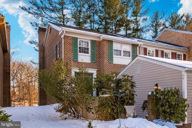 view of snow covered property