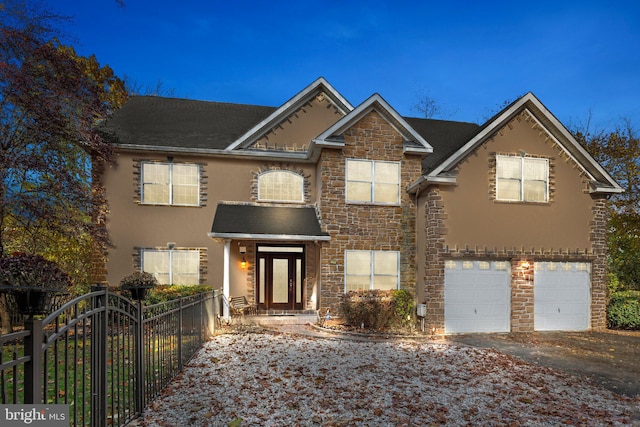 view of front of property featuring a garage