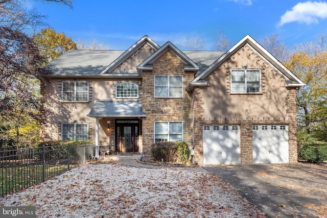 view of front of property featuring a garage