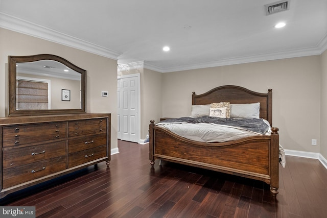 bedroom featuring dark hardwood / wood-style flooring and ornamental molding