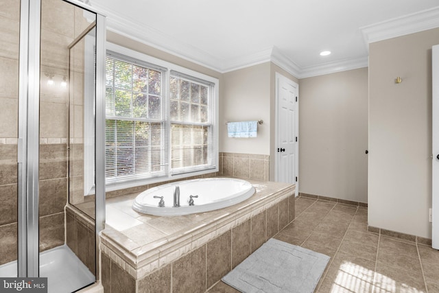 bathroom with independent shower and bath, tile patterned floors, and ornamental molding