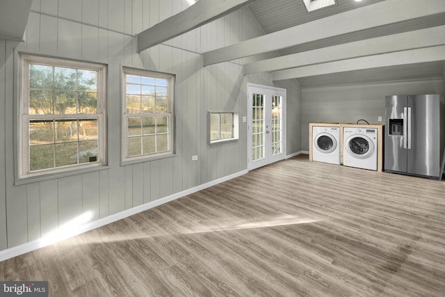 laundry area featuring french doors and independent washer and dryer