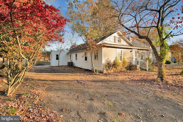 view of side of home featuring central air condition unit