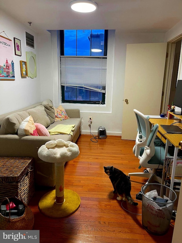 living room with hardwood / wood-style flooring