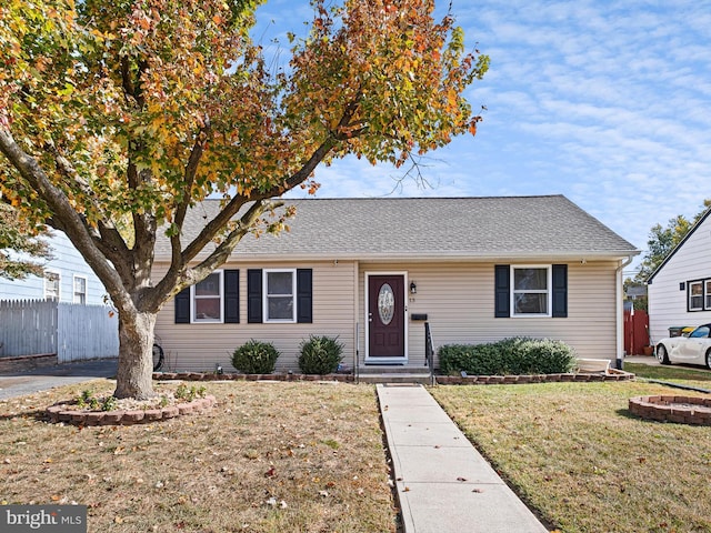 view of front of home with a front yard