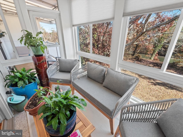 sunroom featuring a wealth of natural light