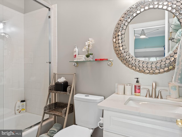 full bathroom with vanity, toilet, ceiling fan, and enclosed tub / shower combo