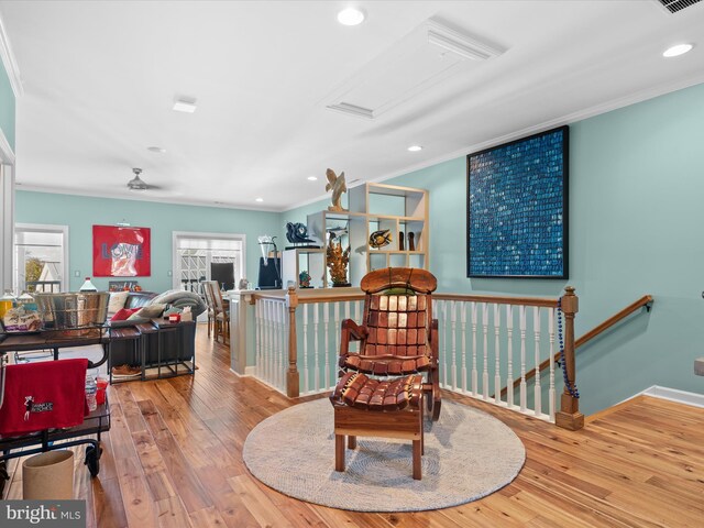 37601 Atlantic St Unit 8, Rehoboth Beach, DE 19971 - sitting room featuring an upstairs landing, crown molding, wood-type flooring, recessed lighting, and baseboards