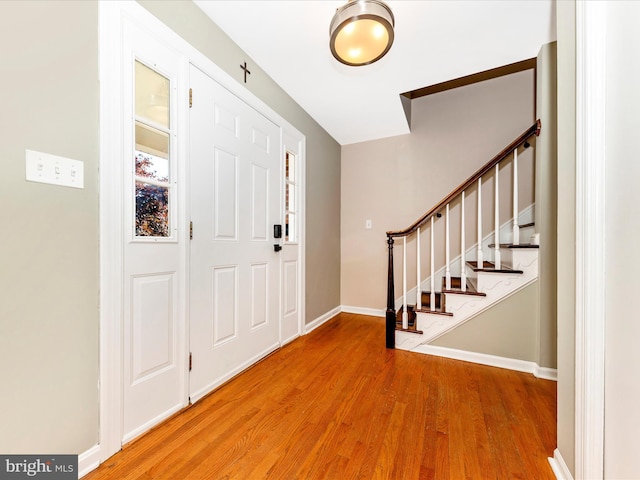 foyer with hardwood / wood-style flooring