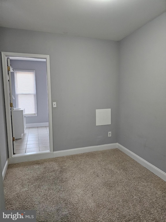 view of carpeted spare room