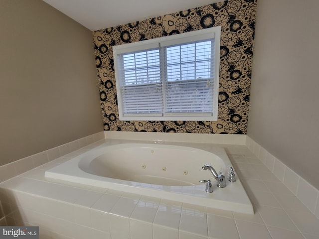 bathroom featuring tiled tub