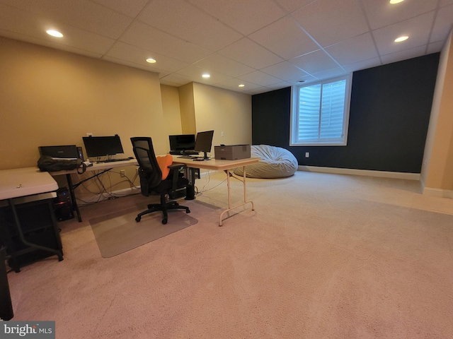 office space with carpet flooring and a paneled ceiling