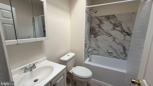 full bathroom featuring vanity, toilet, and tiled shower / bath combo