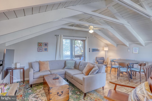 living room with lofted ceiling with beams, ceiling fan, and light hardwood / wood-style flooring