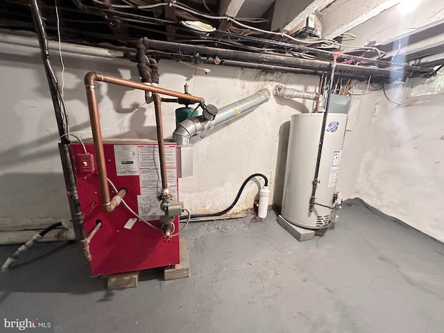 utility room featuring water heater