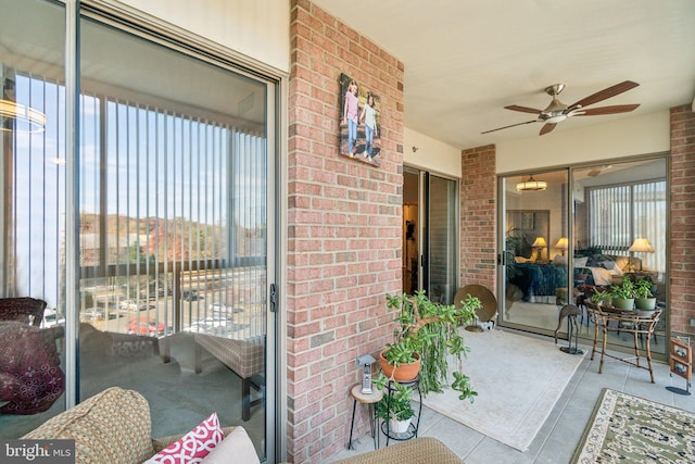 exterior space featuring ceiling fan