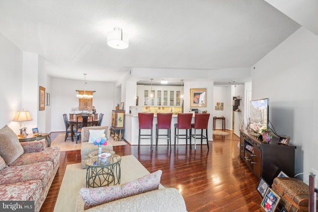 living room with dark wood-type flooring