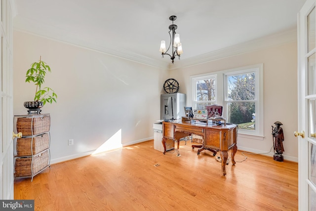 office with crown molding, light hardwood / wood-style floors, and an inviting chandelier