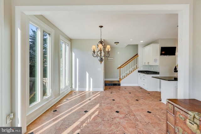 interior space featuring a chandelier