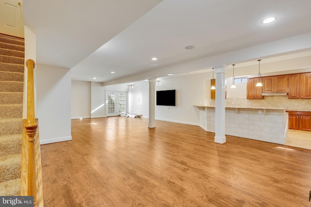 interior space featuring french doors and light hardwood / wood-style flooring