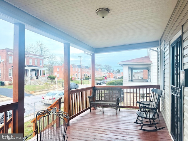 wooden deck featuring a porch