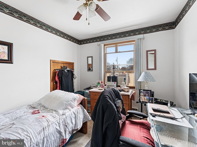 carpeted bedroom featuring ceiling fan