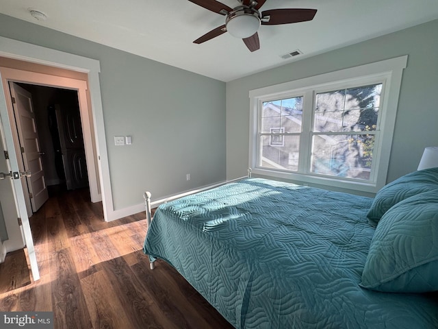 bedroom with wood-type flooring and ceiling fan