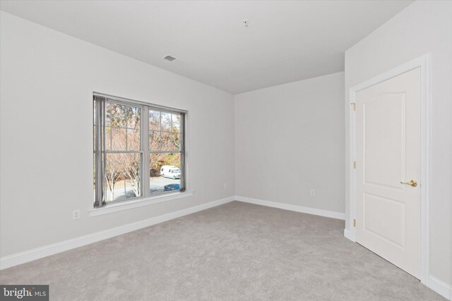 3000 Fountainview Cir Unit 201, Newark, DE 19713 - unfurnished room with carpet and baseboards