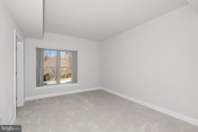 3000 Fountainview Cir Unit 201, Newark, DE 19713 - unfurnished room with light carpet and baseboards