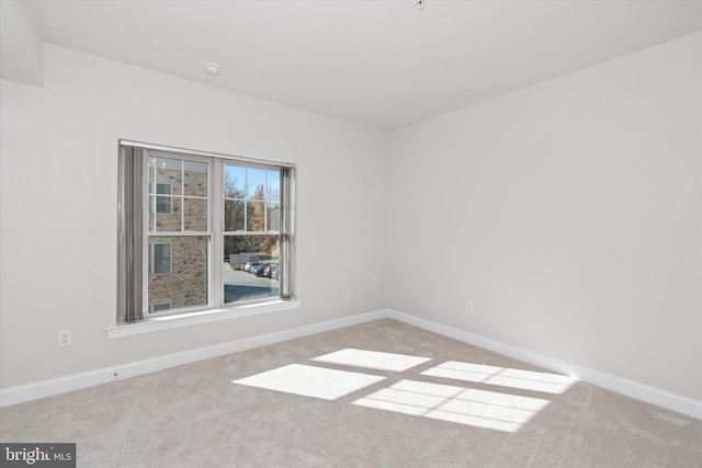 3000 Fountainview Cir Unit 201, Newark, DE 19713 - carpeted empty room with baseboards