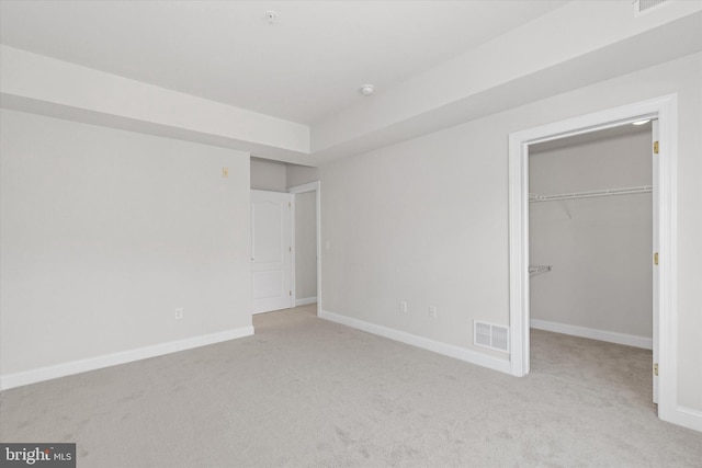 3000 Fountainview Cir Unit 201, Newark, DE 19713 - unfurnished bedroom featuring carpet floors, baseboards, a spacious closet, and a closet