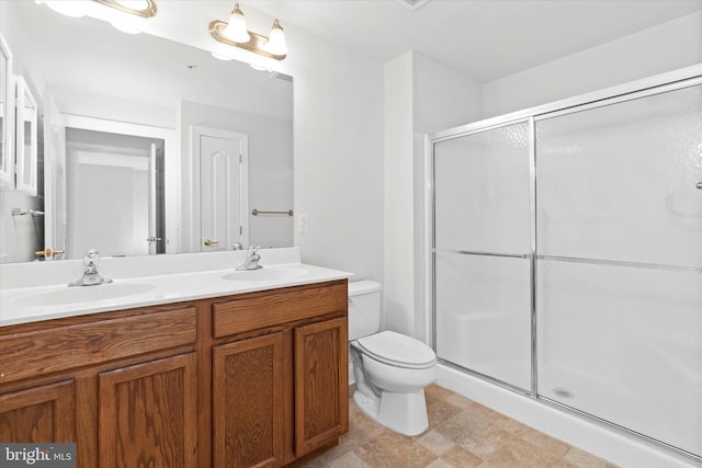 3000 Fountainview Cir Unit 201, Newark, DE 19713 - bathroom with a stall shower, toilet, and double vanity