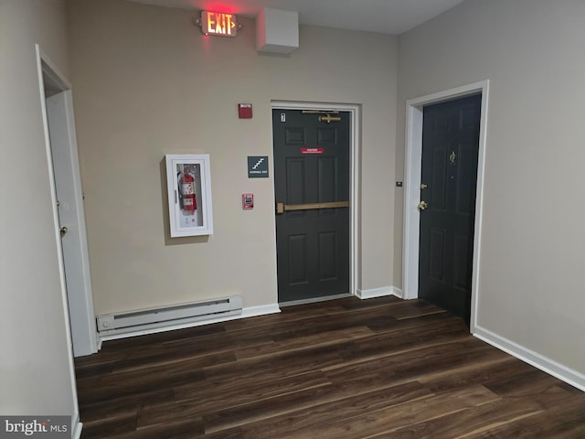 3000 Fountainview Cir Unit 201, Newark, DE 19713 - entryway with baseboard heating, dark wood finished floors, and baseboards