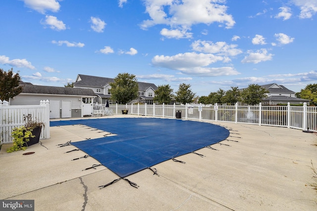 view of pool featuring a patio