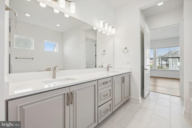 bathroom with vanity and tile patterned floors