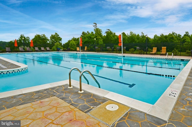 view of pool featuring a patio