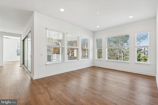 interior space with hardwood / wood-style floors