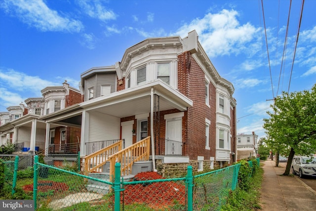 view of front of property featuring covered porch