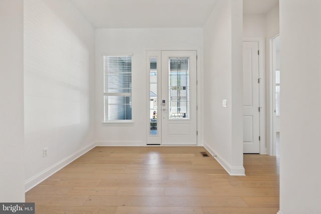 entrance foyer featuring light wood-type flooring